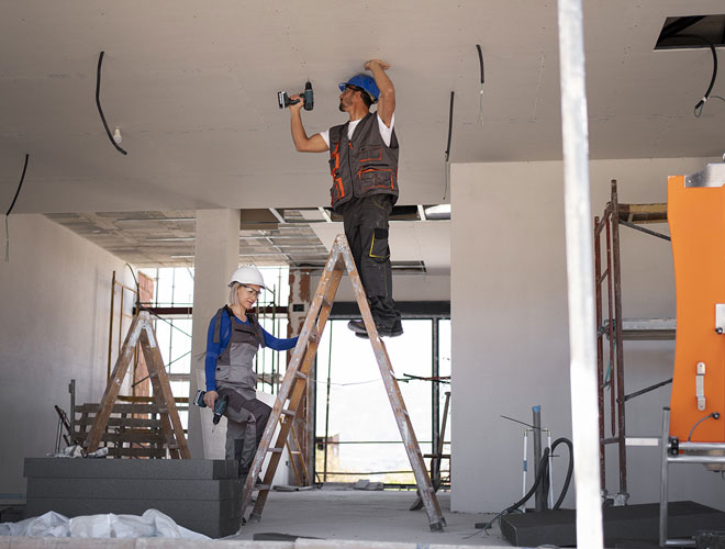 Tradesmen performing property maintenance repairs in Perth for Your Trade Solutions