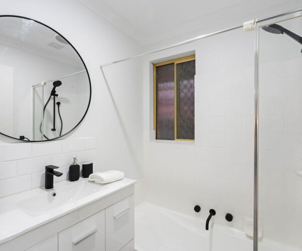 Renovated bathroom in Perth featuring modern fixtures and finishes following full home renovation by Your Trade Solutions